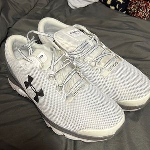 Under Armour Charged Gemini size 13 sneakers.